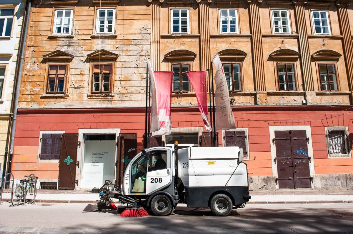 Road street sweeper in Ljubljana streets.